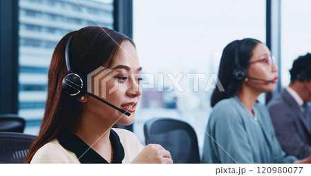 Call center, headset and Japanese woman for customer service, technical support and advice in agency. Female person, coworking and consulting as virtual assistant, talking and feedback for help desk 120980077