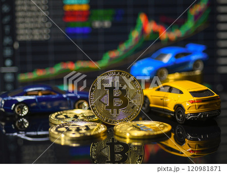 Bitcoin and car model with graph background Bitcoin and car model with graph background 120981871