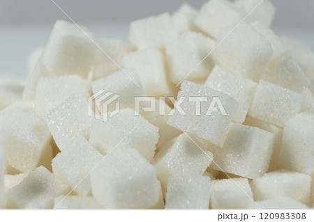 Cubes of white crystalline beetroot refined sugar. Cubes of white crystalline beetroot refined sugar. 120983308