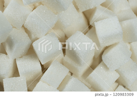 Cubes of white crystalline beetroot refined sugar. Cubes of white crystalline beetroot refined sugar. 120983309