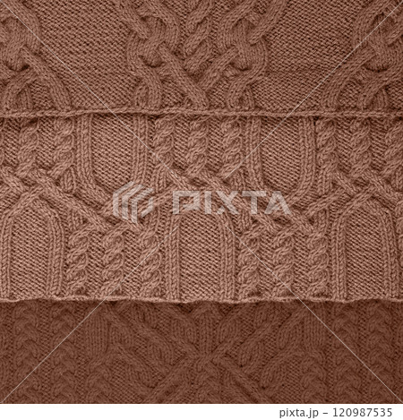 Demonstrating the colors of 2025 - Mocha Mousse. Knitted abstract background in three shades in trendy colors 2025. Large knitted blanket or sweater with pattern. Color concept. 120987535