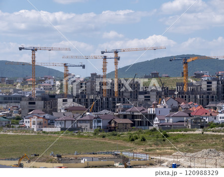Novorossiysk many hoisting cranes and buildings under construction Novorossiysk many hoisting cranes and buildings under construction 120988329
