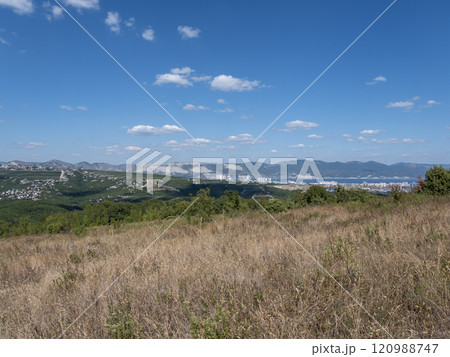 Black sea coast. bald mountain. Beautiful blue sea in Novorossiysk Black sea coast. bald mountain. Beautiful blue sea in Novorossiysk 120988747