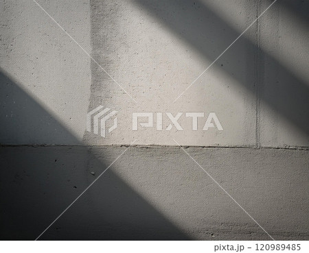 Textured Concrete Wall with Natural Light 120989485