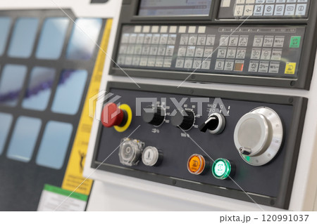 close up of CNC metalworking lathe control panel close up of CNC metalworking lathe control panel 120991037