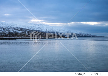 Winter landscape with ocean and mountains, Norway 120991108