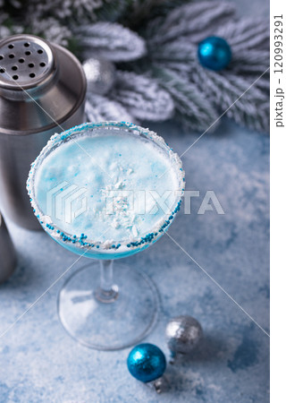 Christmas cocktail with blue curacao 120993291