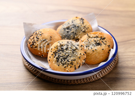 Asian deep fried dough filled with black sesame paste, Thai style Asian deep fried dough filled with black sesame paste, Thai style 120996752