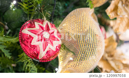 Christmas decoration on tree. 120997038