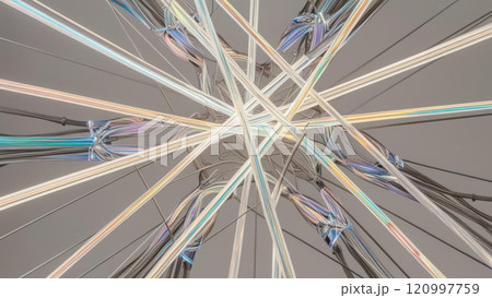 Dynamic light beams create interconnected holographic design, showcasing ultra modern technology in artistic display. optical fiber art captivates with its vibrant colors and intricate patterns 120997759