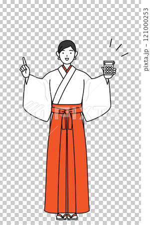身著白衣、身穿猩紅色袴的巫女用計算機指著 身著白衣、身穿猩紅色袴的巫女用計算機指著 121000253