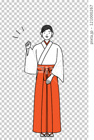 穿著白大褂、穿著猩紅色袴的巫女在握拳 121000267