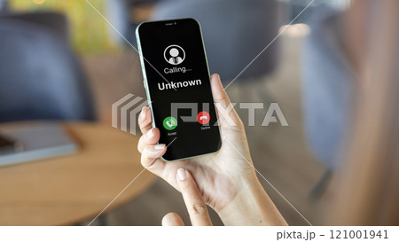 Scam with mobile phone, Woman receives a phone call from an unknown number, Concept of scammers or strangers, Fraud and contact to sell mobile internet promotions, Spam, Fake identity, Scammer. Scam with mobile phone, Woman receives a phone call from an unknown number, Concept of scammers or strangers, Fraud and contact to sell mobile internet promotions, Spam, Fake identity, Scammer. 121001941