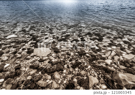 Rocky river bank 121003345