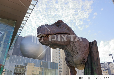 Animatronic robot dinosaur statues at Fukui train and bus stations in Fukui City in Japan 121005671