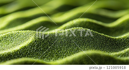 Green wavy olivine sand texture, shiny sugar crystals, resembling candy or a sweet dessert 121005918