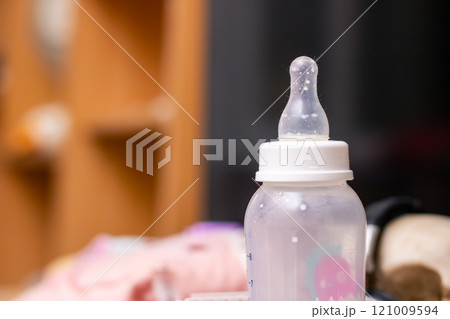 This is a baby bottle that has the number 0 printed on it This is a baby bottle that has the number 0 printed on it 121009594