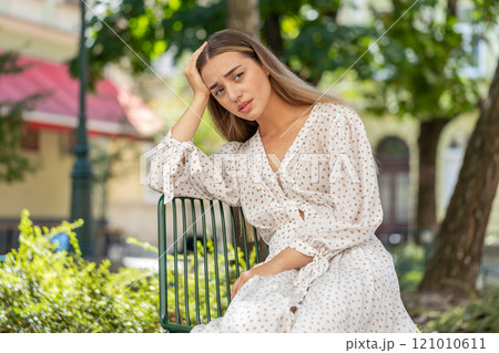 Sad unhappy Caucasian young woman suffers from unfair situation feeling bad annoyed burnout grief 121010611