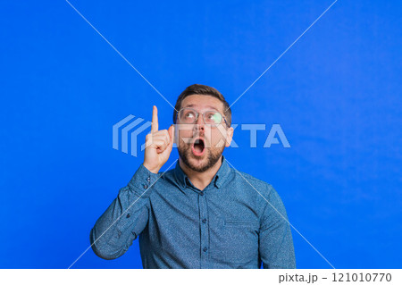 Inspired young man having good idea, plan, startup, showing inspiration motivation Eureka gesture 121010770