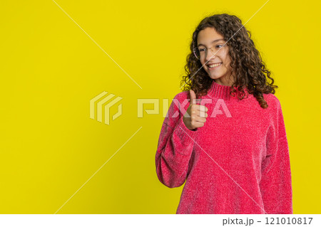 Caucasian girl raises thumbs up agrees give positive reply recommends advertisement likes good idea 121010817