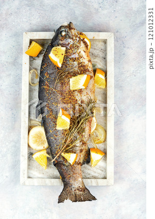 Parchment baked rainbow trout. Parchment baked rainbow trout. 121012331