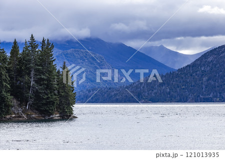 Low clouds covering mountains surrounding Lake Nahuel Huapi Low clouds covering mountains surrounding Lake Nahuel Huapi 121013935