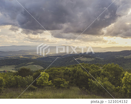 USA, Virginia, Newport, Storm clouds over hilly landscape at sunset 121014132