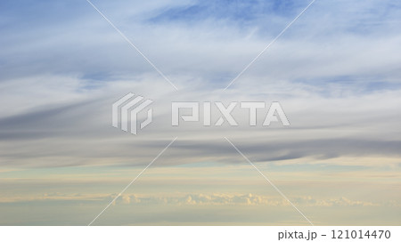 Layers of clouds from altitude 31,000 feet at sunrise 121014470