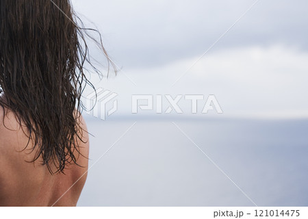Woman enjoying view of Caribbean Sea, US Virgin Islands, USA 121014475