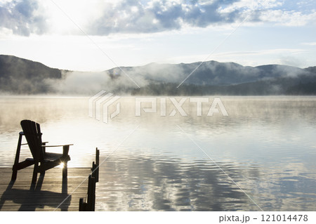 Boat dock at sunrise, Lake Placid, New York, USA Boat dock at sunrise, Lake Placid, New York, USA 121014478