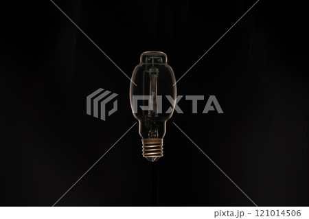 Studio shot of light bulb against black background 121014506