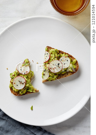 Overhead view of avocado toast on plate Overhead view of avocado toast on plate 121014594