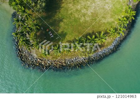 Drone view of tropical island and turquoise sea 121014963