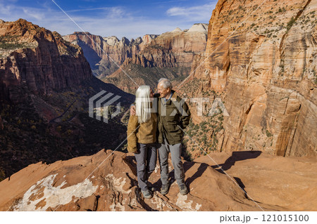 Smiling senior couple embracing at Zion Overlook 121015100