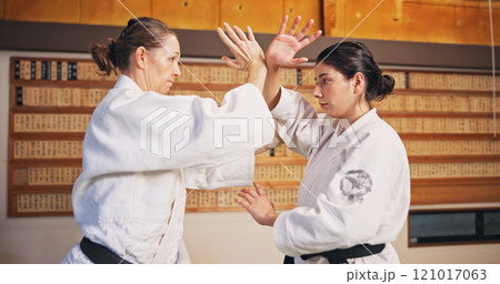 Martial arts, fight demonstration and women with learning, exercise and karate etiquette in dojo. Japan, training and studio with sport, discipline and warrior in taekwondo class in gym with strike Martial arts, fight demonstration and women with learning, exercise and karate etiquette in dojo. Japan, training and studio with sport, discipline and warrior in taekwondo class in gym with strike 121017063