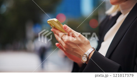 Hands, city and phone with woman on street with social media, job texting and internet scroll in Japan with business commute. Work, digital news and web outdoor with travel with maps app on mobile Hands, city and phone with woman on street with social media, job texting and internet scroll in Japan with business commute. Work, digital news and web outdoor with travel with maps app on mobile 121017379