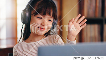 Elearning, video call and child with laptop, greeting and education for girl, headphones or listening. Home, happy and online class for kid, studying and scholarship for youth, communication or Japan 121017693