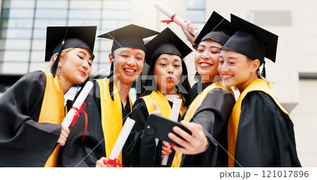 Friends, college student and happy on graduation with selfie for social media or profile picture in Japan. People, campus and smile with scroll for memories, success and achievement as classmates Friends, college student and happy on graduation with selfie for social media or profile picture in Japan. People, campus and smile with scroll for memories, success and achievement as classmates 121017896