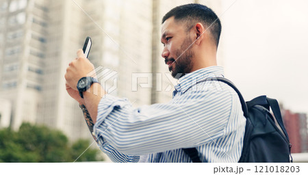 Man, phone and travel in city with search for direction, location or hotel with mobile application in street. Person, smartphone and check route with map, web and commute on urban sidewalk in Japan Man, phone and travel in city with search for direction, location or hotel with mobile application in street. Person, smartphone and check route with map, web and commute on urban sidewalk in Japan 121018203