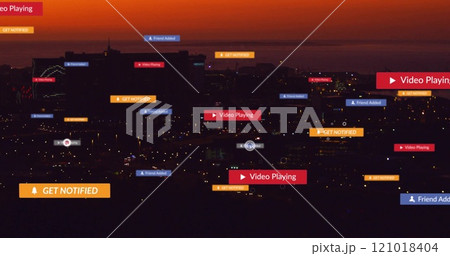Cityscape at dusk with social media notifications image over buildings and lights 121018404