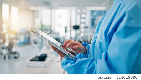 Healthcare, scrubs and tablet with hands of nurse in hospital for diagnosis, research or telehealth. Internet, medical and technology with medicine professional person closeup at clinic in Japan 121018680