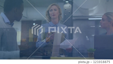 Image of financial data processing over diverse business people in office Image of financial data processing over diverse business people in office 121018875