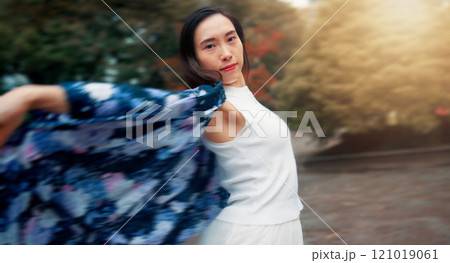 Contemporary dance, portrait and woman outdoor with rhythm for self expression and creativity. Classical, art and Japanese person with interpretaive choreography in park for rehearsal or practice. Contemporary dance, portrait and woman outdoor with rhythm for self expression and creativity. Classical, art and Japanese person with interpretaive choreography in park for rehearsal or practice. 121019061