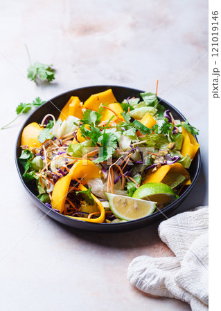 Vietnamese mango salad with nuts and vegetables. 121019146