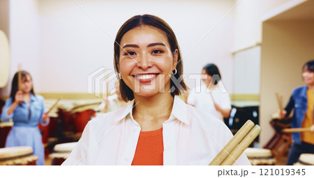 Portrait, Japanese woman and instrument of teaching music, community practice and art performance. Teacher, arms crossed and drum sticks of festival band, spiritual ritual and wadaiko talent in Japan Portrait, Japanese woman and instrument of teaching music, community practice and art performance. Teacher, arms crossed and drum sticks of festival band, spiritual ritual and wadaiko talent in Japan 121019345