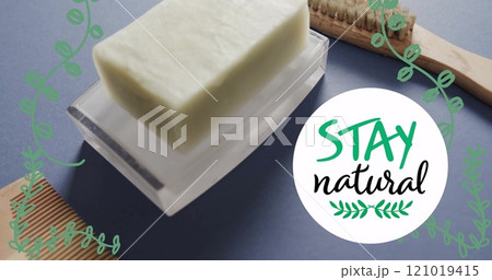 Image of stay natural text and leaves over organic soap, wooden comb and brush Image of stay natural text and leaves over organic soap, wooden comb and brush 121019415