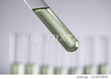 Close up of laboratory test tubes with copy space on grey background Close up of laboratory test tubes with copy space on grey background 121019935