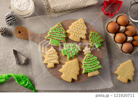 Decorated christmas cookies with copy space on grey background 121020711