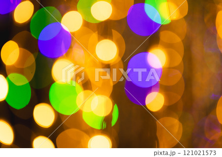 Multi coloured bokeh lights with copy space on dark background 121021573