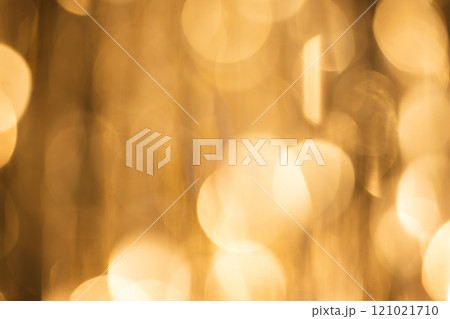 Yellow bokeh lights with copy space on dark background 121021710